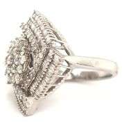 10kt White gold 2.65ctw round and baguette diamond cluster ring