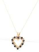 10kt Yellow gold Sapphire and diamond open heart pendant on chain