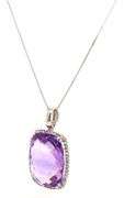 14kt White gold Elongated cushion cut amethyst and diamond halo pendant on chain
