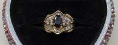 14kt Yellow Gold Oval Blue Sapphire and 1.20ctw Baguette Diamond Ring