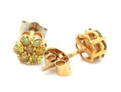 14kt Yellow gold yellow sapphire flower style stud earrings