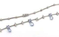 18kt White gold diamond and round and Briolette cut Tanzanite link chain necklace