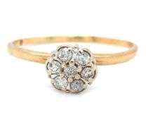 10kt Yellow gold flower style diamond ring