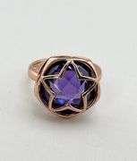 925 Sterling Silver Faceted Amethyst Held within A Distinctive Star Shape Ring
