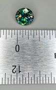 Dazzling 6.5 Deep Emerald Green Moissanite Solitaire