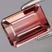 VS grade! Violet pink! 1.28ct solitaire grade Tourmaline!