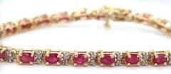 14kt Yellow gold ruby and diamond link bracelet