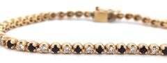 14kt Yellow gold round brilliant cut blue sapphire and diamond link bracelet