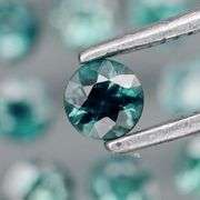 Heated only! 3.14ct blue green Sapphire set