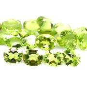 Dazzling 9.20ct untreated apple green Peridot set
