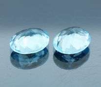 Huge! 12x10mm pair of swiss blue Topaz weighing 9.10 carats!