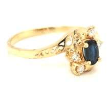 14kt Yellow gold oval sapphire and diamond ring