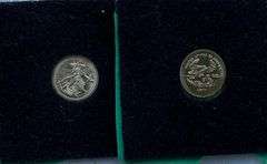 Two 14 k Gold Eagle Tribute Tokens