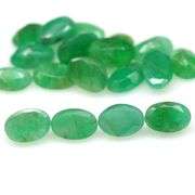 Vivid color in this 8.03ct Zambian Emerald set