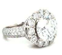 18kt White gold 5.05ct lab grown round brilliant cut with 2.65ctw halo with pave diamond setting
