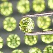 Dazzling 4.62ct untreated super clean apple green Peridot set