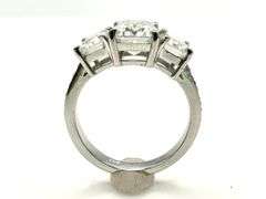 14 Kt White Gold Plate 5.25 Ctw 3 Stone Emerald Cut Ice White Fire Moissanite Ring