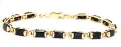 14kt Yellow gold emerald cut black onyx station bracelet