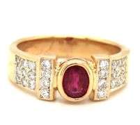 14kt Yellow gold 0.50ct oval ruby and 0.25ctw diamond ring