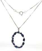 14kt White gold blue sapphire and diamond pendant on chain