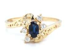 14kt Yellow gold oval sapphire and diamond ring