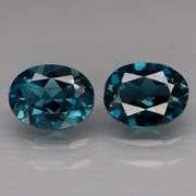 Glittering VS grade 4.44ct pair of London blue Topaz!