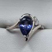 Very fine Tanzanite ring in silver , GGA certified with diamond