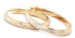 14kt Yellow gold diamond cut oval hoop earrings