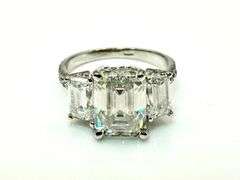 Sparkling 5.5 Ctw 3 Stone Emerald Cut Ice White Fire Moissanite Ring