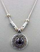 925 Sterling silver Garnet Cab 2 tone pendant on chain