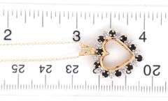 10kt Yellow gold Sapphire and diamond open heart pendant on chain