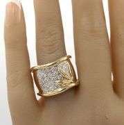 18kt Yellow gold 1.27ctw diamond wide wave ring with leaf motif