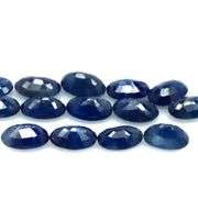 Beautifully colored 7.40ct ink blue Sapphire set