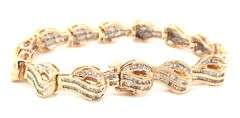 14kt Yellow gold 4.50ctw baguette diamond wave bracelet