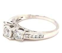 14kt White gold 0.85ctw 3 stone Illusion set engagement ring