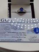 Very fine Natural Tanzanite 2.30 ctw with diamond accent set in silver ring, GGAcertified