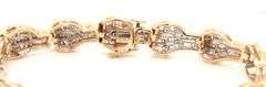 14kt Yellow gold 4.50ctw baguette diamond wave bracelet