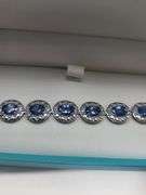 A true statement of elegance of Tanzanite and diamond Bracelet in Silver – GGA Certified. Set in lus