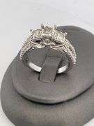 CERTIFIED LADIES 10K WHITE GOLD AND DIAMOND RING.