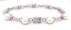 14kt White gold 6.5-7mm pearl and diamond accent bracelet