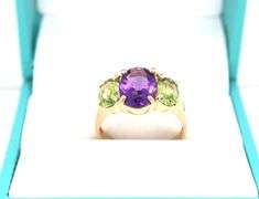 14kt Yellow gold 2.40ctw amethyst and 1.25ctw peridot cocktail ring