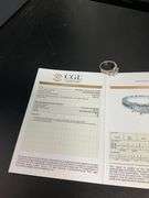 CERTIFIED LADIES 10K WHITE GOLD AND DIAMOND RING.