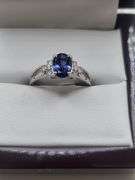 Very fine Tanzanite ring in silver , GGA certified with diamond