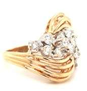 14kt Yellow gold 1.15ctw diamond cluster ring with a bypass shank