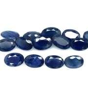 Beautifully colored 7.40ct ink blue Sapphire set
