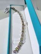 Old Fashion Silver Bracelet with high value Diamonds, Emeralds, and Rubies