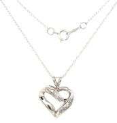 10kt White gold diamond heart shaped pendant on chain