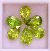 Collectors 5.67ct vivid lime green Sphene set