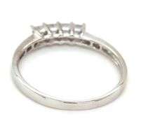 14kt White gold princess cut channel set diamond band