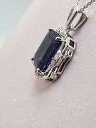Extremely fine quality Lab grown Sapphire 7.33 CTW and diamond pendent in silver, GGA certfied